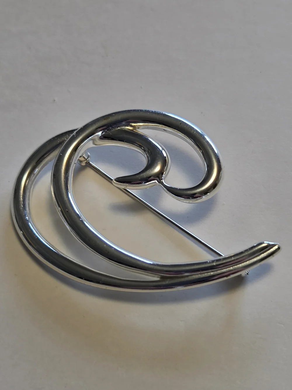Vtg Crown Trifari Glossy Silver-Tone Modernist Wave Brooch